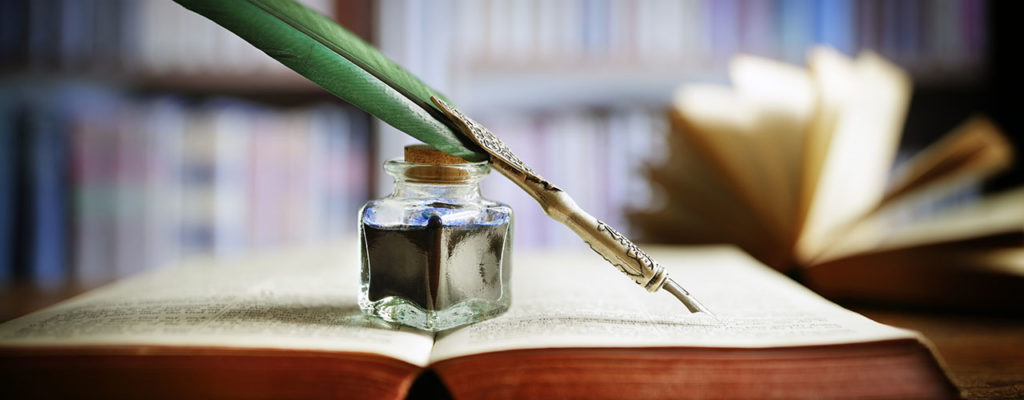 Quill Pen with Ink and Book